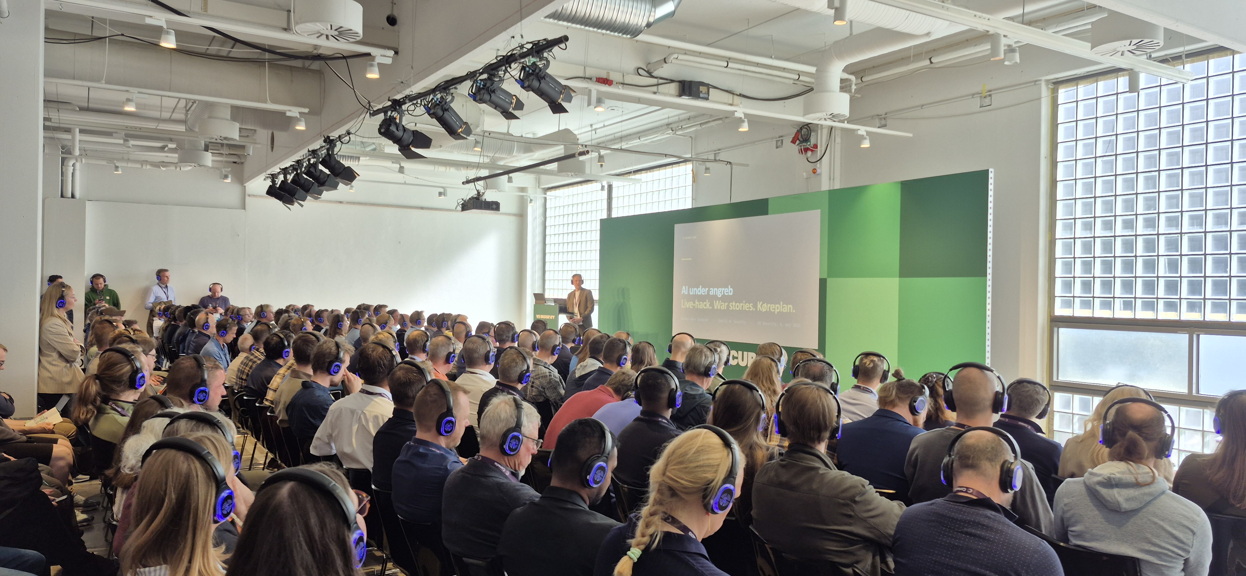 Conference attendees interacting